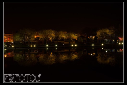 Final shot is several hours after the previous three. Lights from the city and Taupo Quay reflect in the river.