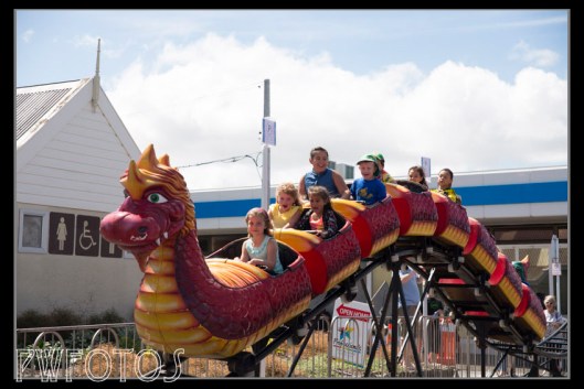 To many of the kids on this ride this will be their first roller coaster. The girl in front has supreme confidence while the two behind don't look like they are enjoying themselves