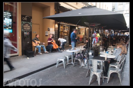 Street side cafes are in many of the alleys and so are buskers 