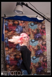 This pullback shot shows the position of the hair light.